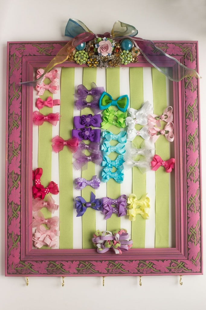 DIY Hair Bow Holder - Make a hair bow holder for less than $20 in custom colors to match your daughter's bedroom. It's a great baby shower gift too!