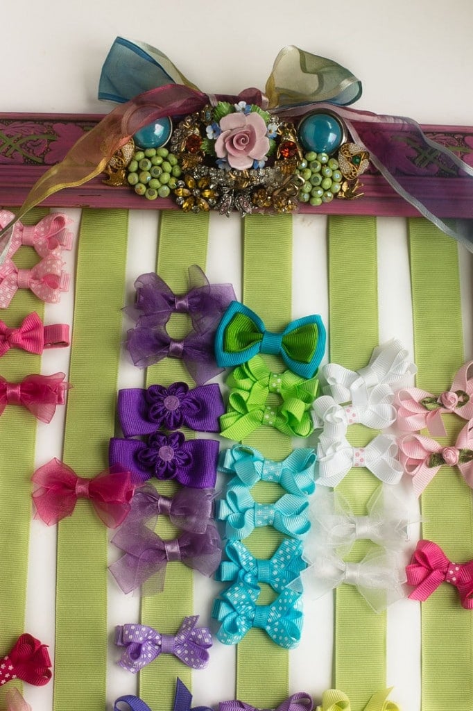 DIY Hair Bow Holder - Make a hair bow holder for less than $20 in custom colors to match your daughter's bedroom. It's a great baby shower gift too!