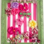 DIY Hair Bow Holder - Make a hair bow holder for less than $20 in custom colors to match your daughter's bedroom. It's a great baby shower gift too!