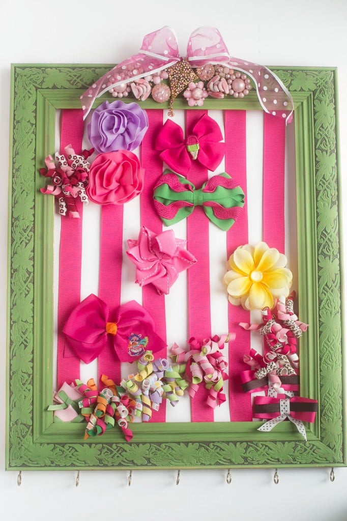 DIY Hair Bow Holder - Make a hair bow holder for less than $20 in custom colors to match your daughter's bedroom. It's a great baby shower gift too!