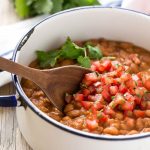 These Easy Mexican Pinto Beans and Rice are the perfect sides for your Mexican Meal. The mexican rice has a secret ingredient that makes it taste like it came from a restaurant, and the pinto beans are ready in just 10 minutes.