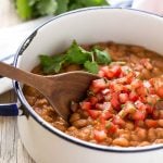 These Easy Mexican Pinto Beans and Rice are the perfect sides for your Mexican Meal. The mexican rice has a secret ingredient that makes it taste like it came from a restaurant, and the pinto beans are ready in just 10 minutes.