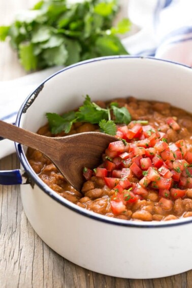 These Easy Mexican Pinto Beans and Rice are the perfect sides for your Mexican Meal. The mexican rice has a secret ingredient that makes it taste like it came from a restaurant, and the pinto beans are ready in just 10 minutes.
