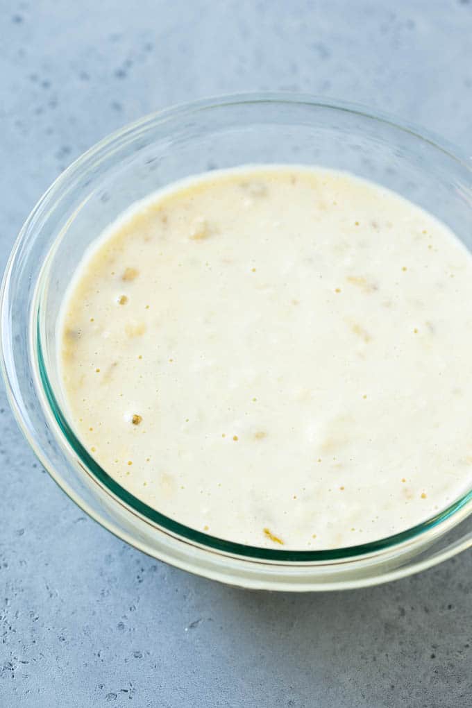 A bowl of banana pancake batter.