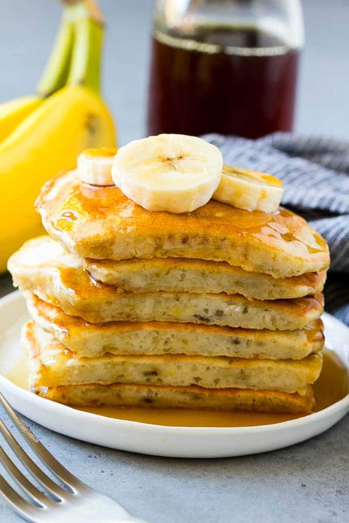 A cross section of a stack of banana pancakes.