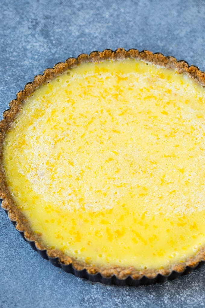 A graham cracker tart crust baked with lemon filling.