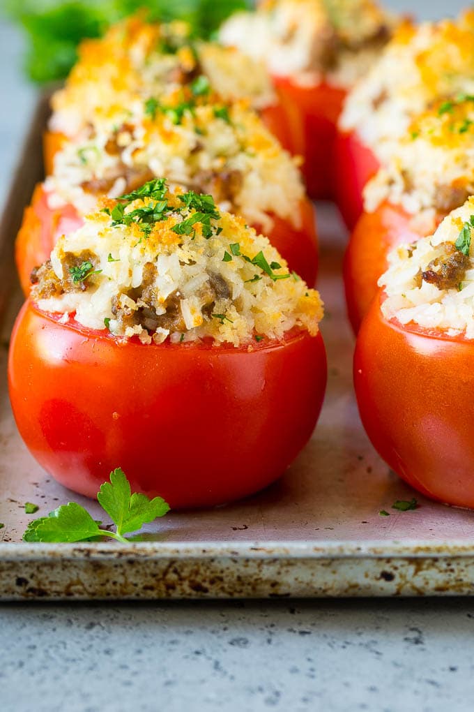 Stuffed tomatoes filled with rice, Italian sausage and cheese.