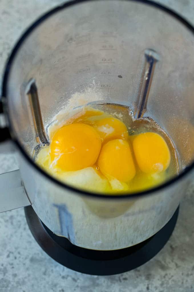 Eggs, milk, sugar and flour in a blender.