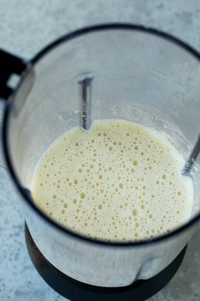 A blender full of pancake batter.