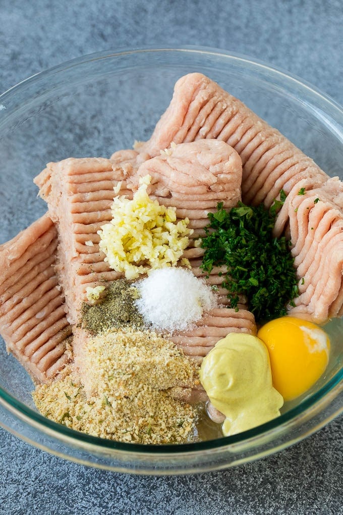 Ground turkey, breadcrumbs, seasonings and garlic in a mixing bowl.