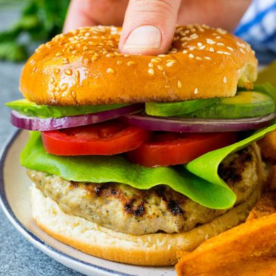 The best turkey burgers topped with lettuce, tomato, red onion and avocado.