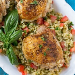 This one pot chicken with tomato basil risotto is the perfect weeknight meal - the whole thing bakes in the oven in a single dish!