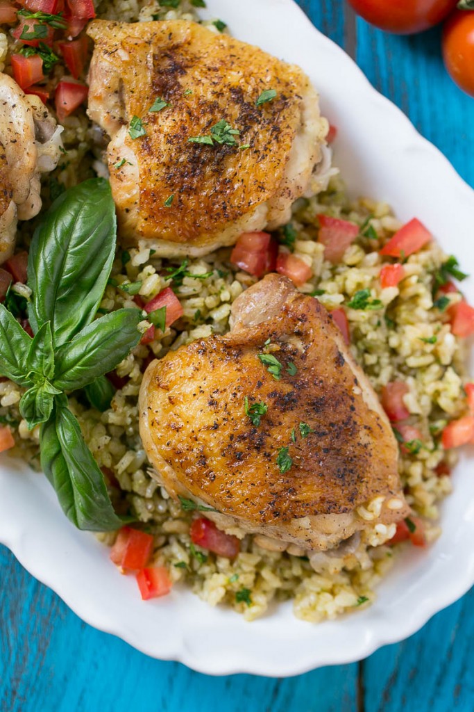 This one pot chicken with tomato basil risotto is the perfect weeknight meal - the whole thing bakes in the oven in a single dish!