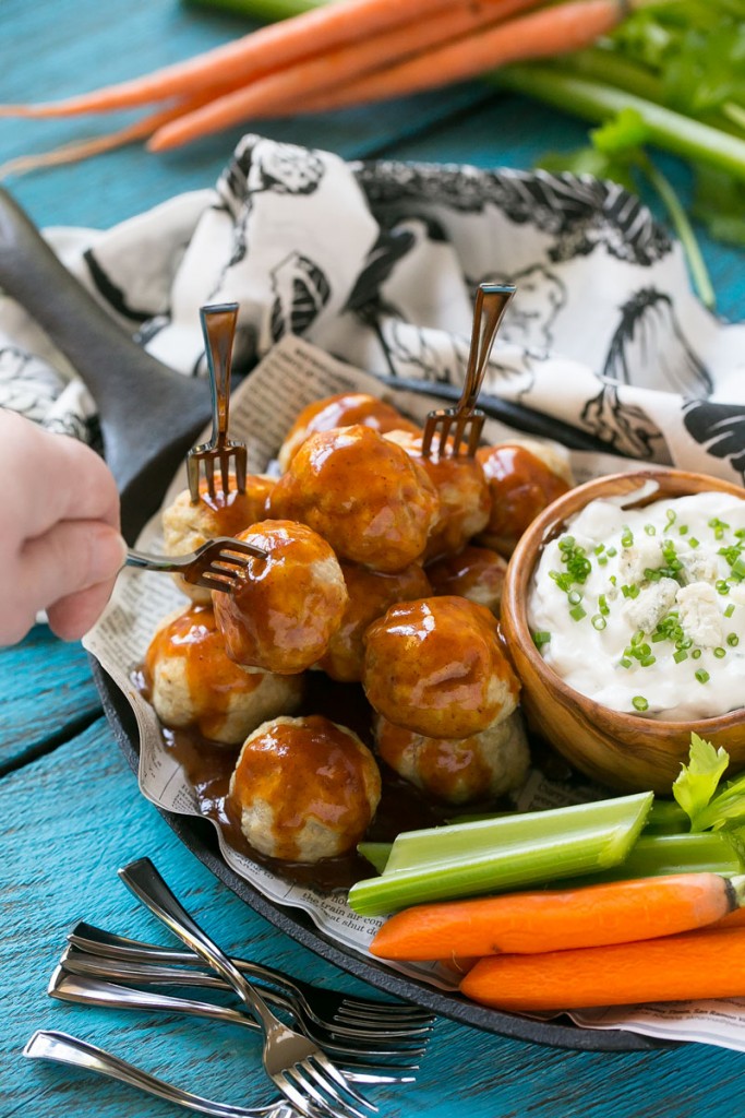 This recipe for buffalo turkey meatballs is tender meatballs made with ground turkey that are tossed in a homemade chipotle sauce and served with a skinny blue cheese dip. TasteOrganicTurkey TurkeyTuesday AD 