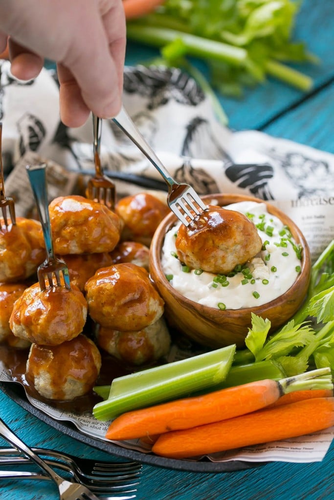 This recipe for buffalo turkey meatballs is tender meatballs made with ground turkey that are tossed in a homemade chipotle sauce and served with a skinny blue cheese dip. TasteOrganicTurkey TurkeyTuesday AD 