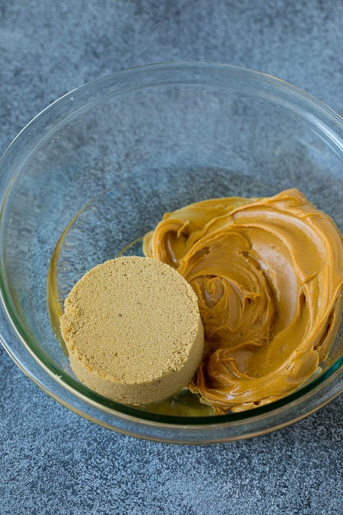 Peanut butter, brown sugar and corn syrup in a bowl.