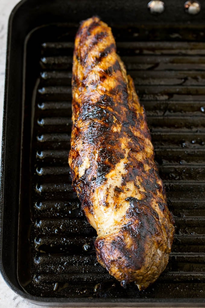 Pork tenderloin cooked on a grill pan.