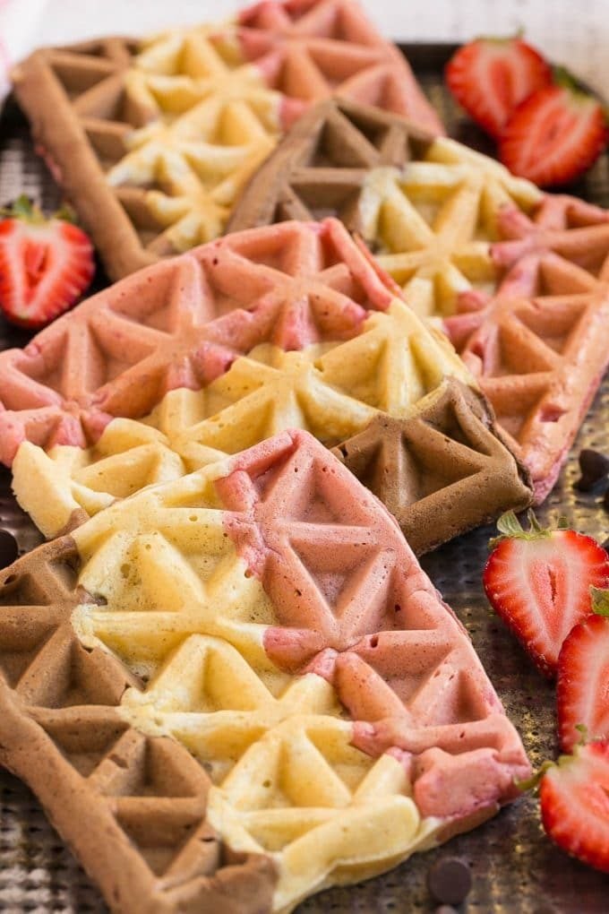 Tri colored waffles on a sheet pan.