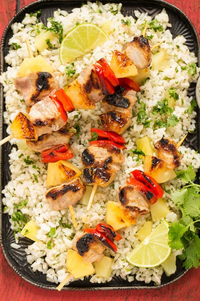 Pork kabobs served over rice.