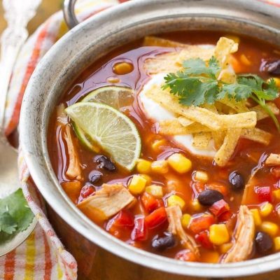A quick and easy chicken taco soup full of beans and vegetables that's ready in just 25 minutes. #StockUpOnDelMonte #Safeway Ad