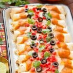 Pumpkin isn't just for dessert! These chicken enchiladas are made with a velvety pumpkin sauce that's totally savory and an unexpected way to elevate enchiladas into a dish fit for company. #ChooseSmart Ad