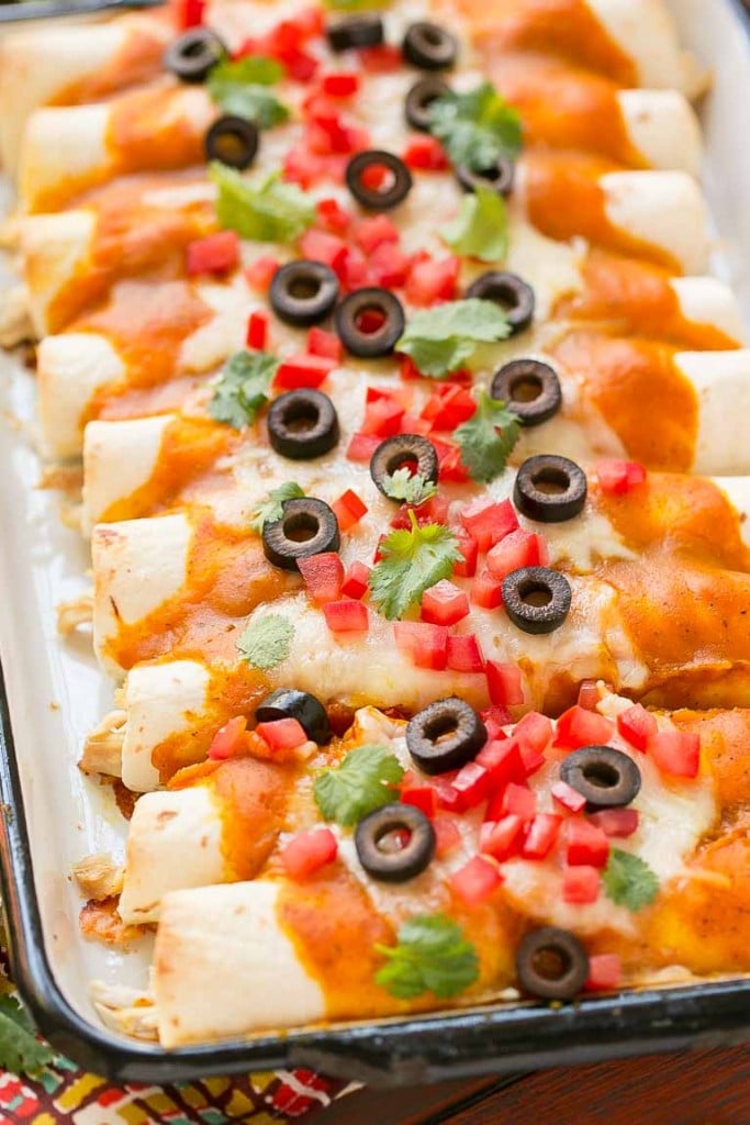 Pumpkin isn't just for dessert! These chicken enchiladas are made with a velvety pumpkin sauce that's totally savory and an unexpected way to elevate enchiladas into a dish fit for company. #ChooseSmart Ad