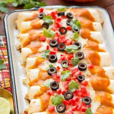 Pumpkin isn't just for dessert! These chicken enchiladas are made with a velvety pumpkin sauce that's totally savory and an unexpected way to elevate enchiladas into a dish fit for company. #ChooseSmart Ad