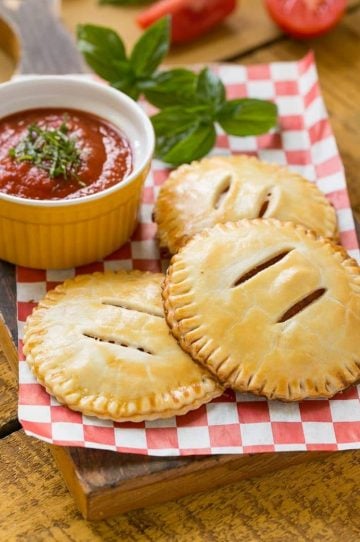 These homemade pepperoni pizza pockets are a fun meal or snack and are super simple to put together - your kids will be thrilled!