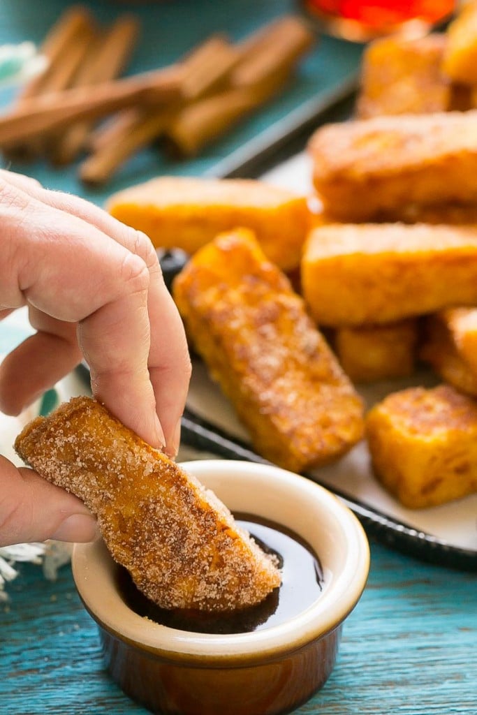 Light and fluffy pumpkin french toast sticks coated in cinnamon sugar. They're super fun to eat and they taste like a churro!