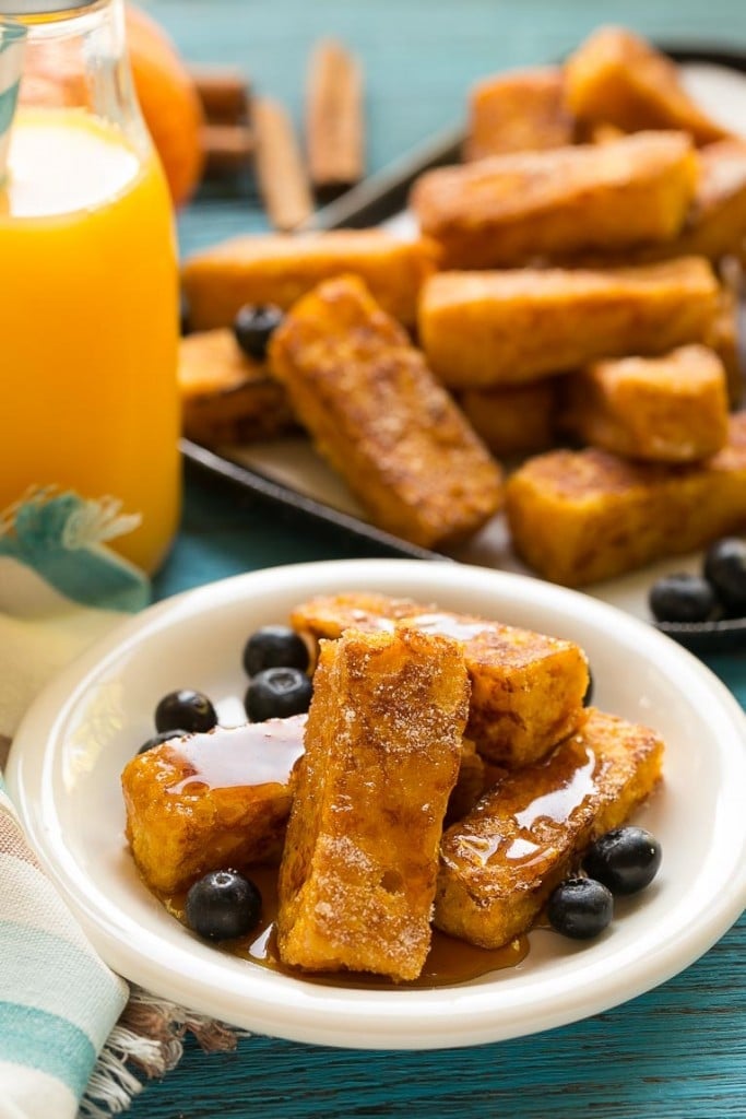 Light and fluffy pumpkin french toast sticks coated in cinnamon sugar. They're super fun to eat and they taste like a churro!