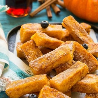 Light and fluffy pumpkin french toast sticks coated in cinnamon sugar. They're super fun to eat and they taste like a churro!