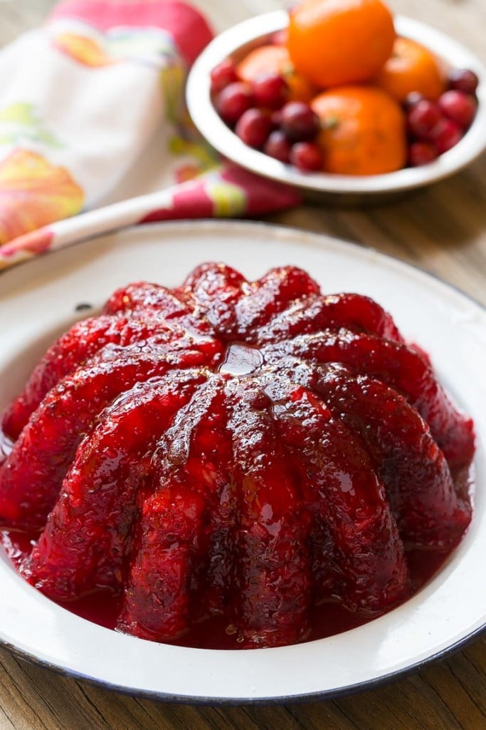 Raspberry gelatin is combined with cranberry sauce, pineapple and orange zest for a delicious side dish or dessert that's perfect for the holidays.