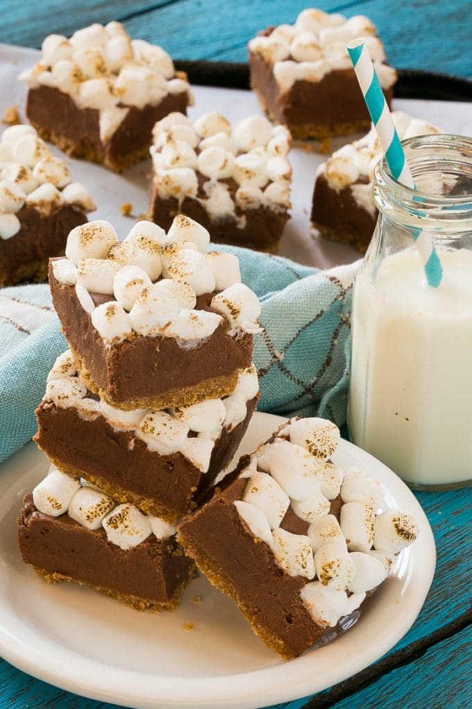 A plate of s'mores fudge with a bottle of milk in the background.