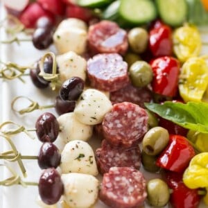 These antipasto skewers are an assortment of italian meats, cheeses, olives and vegetables threaded onto a stick for a super easy yet elegant appetizer.
