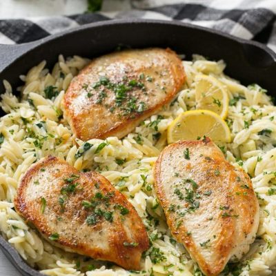 This one pot chicken with creamy spinach artichoke pasta is made with seared chicken breasts, orzo pasta, fresh spinach, artichokes and plenty of cheese. It's a quick and easy weeknight dinner with less dishes to do at the end!