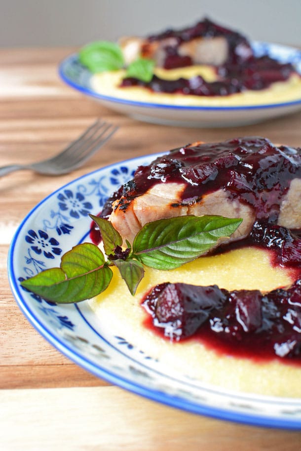 Grilled pork chops with blueberry compote.
