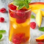 A recipe for light and refreshing raspberry mango iced tea.