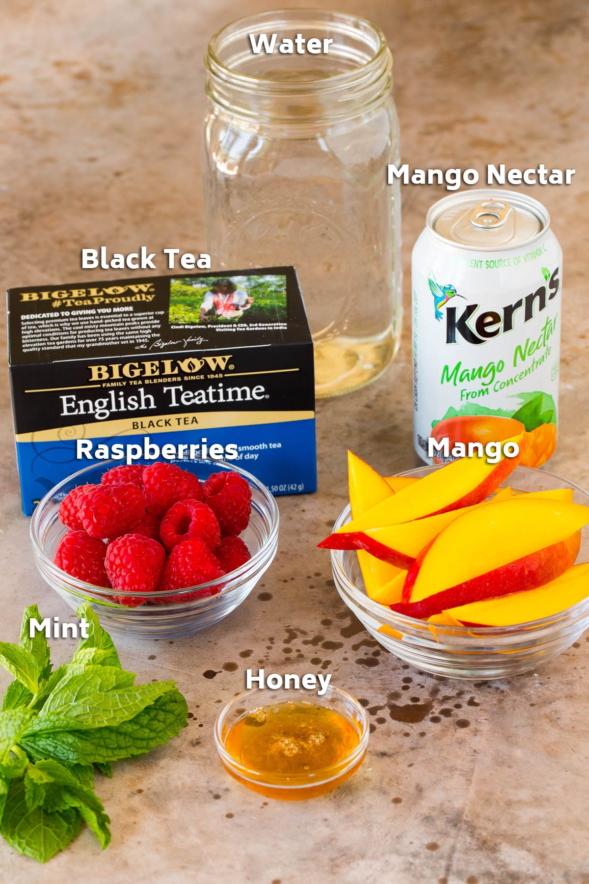 Ingredients including tea, mango nectar, fruit and honey.