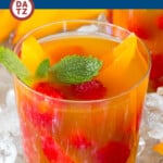 This mango iced tea is a blend of black tea, mango nectar and honey with fresh fruit for garnish.