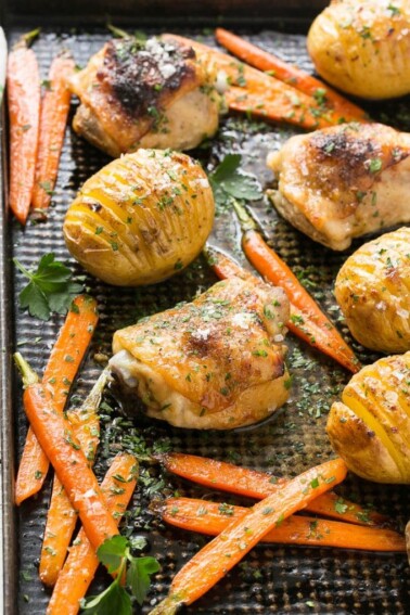 This maple dijon chicken with hasselback potatoes and carrots is a healthy and easy one pan meal that the whole family will love!
