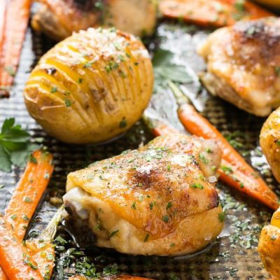 This recipe for maple dijon chicken with hasselback potatoes and carrots is a healthy and easy one pan meal that the whole family will love!