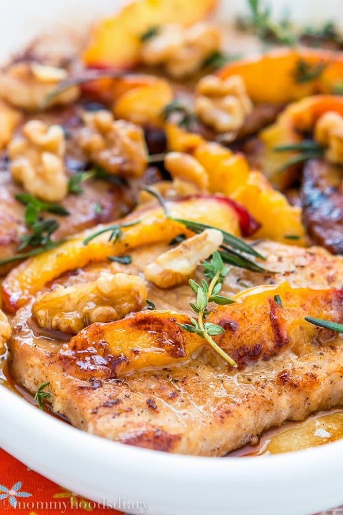 Pork chops with peaches and walnuts.