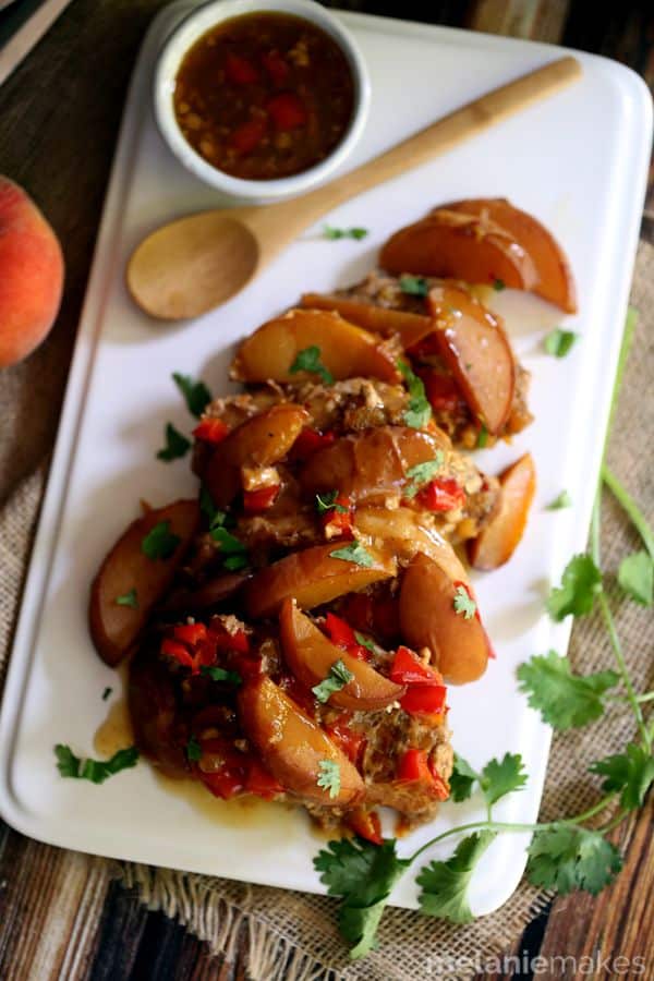 Slow cooker peach and pepper pork chops.