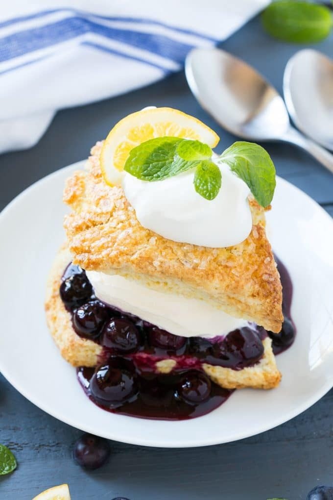 Layers of shortcake, blueberry sauce, vanilla ice cream and whipped cream.