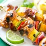 This recipe for Hawaiian Chicken Kabobs is juicy chicken breast, pineapple and vegetables in a sweet and tangy sauce, threaded onto skewers and grilled to perfection. Serve with coconut rice for a taste of the tropics at home!