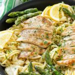 This recipe for lemon asparagus pasta combines tender asparagus and grilled chicken with pasta in a lemon cream sauce. It's a delicious and hearty entree that everyone will want seconds of!
