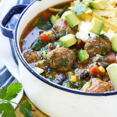 This recipe for mexican meatball soup is loaded with seasoned beef meatballs, black beans and plenty of vegetables in a flavorful and spicy broth. Add your favorite toppings and you've got a complete meal in a bowl!