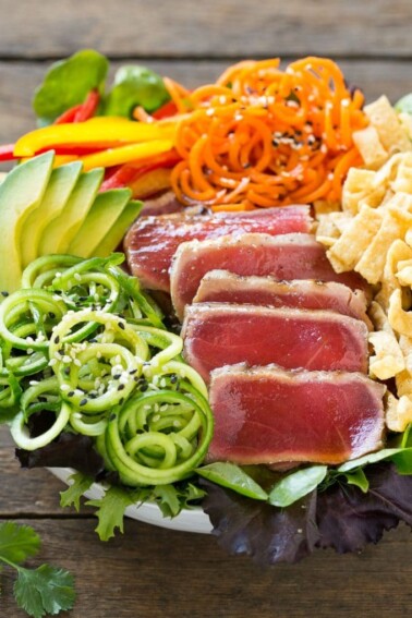 This recipe for ahi tuna salad is seared ahi on a bed of mixed greens with cucumber and carrot noodles, bell peppers, avocado and wontons, all tossed in a sesame ginger dressing. #BBSuperFresh #Seafoodies