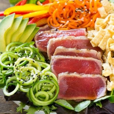 This recipe for ahi tuna salad is seared ahi on a bed of mixed greens with cucumber and carrot noodles, bell peppers, avocado and wontons, all tossed in a sesame ginger dressing. #BBSuperFresh #Seafoodies