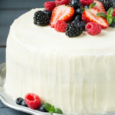 This recipe for berry chantilly cake is a light and yellow cake with plenty of fresh berries and a unique fluffy whipped cream frosting. The perfect cake for a celebration! #BRMEaster #CleverGirls